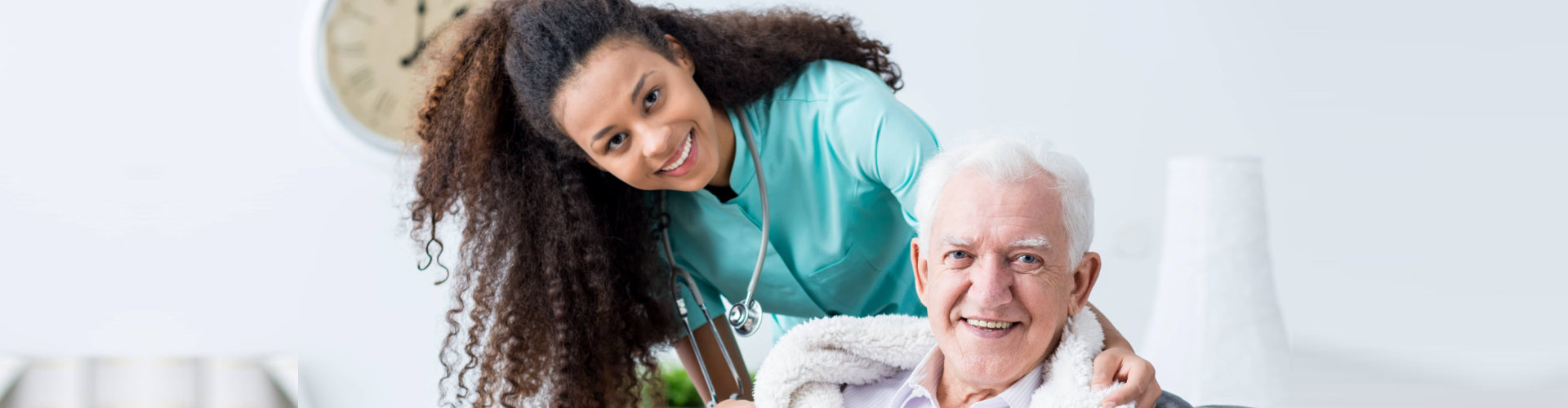 lady nurse and elderly person smiling